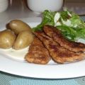 Panerat fläsk med löksås