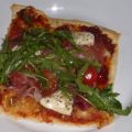 Pizza med parmaskinka och ruccola