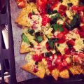 Ugnsgratinerade nachos med jalapeños, tomater[...]